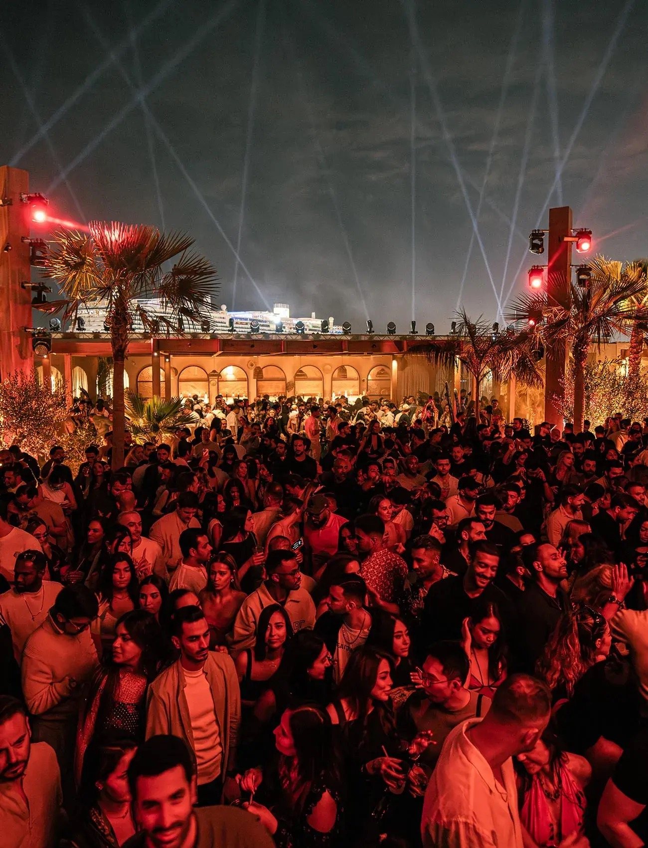 Lasers over the Be Beach terrace at night
